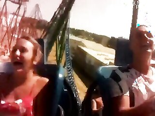 Sexy teen's assets bounce around on thrill ride