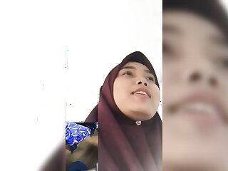 Outdoor webcam show featuring hijaber in Indonesia